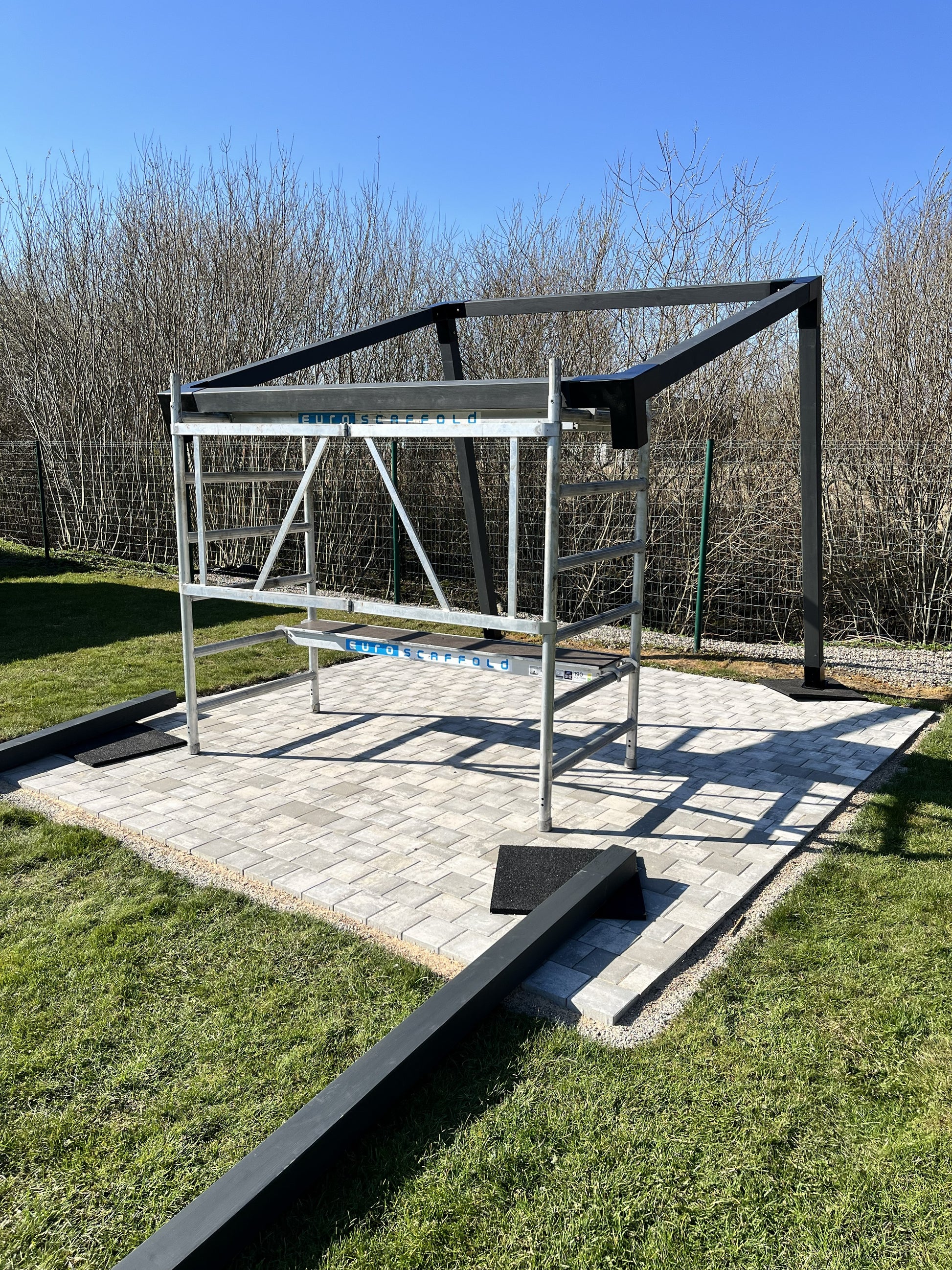 Modular canopy DIY by Terases, 3.5m x 3.5m, with metal frame and fabric cover for outdoor shade and shelter.