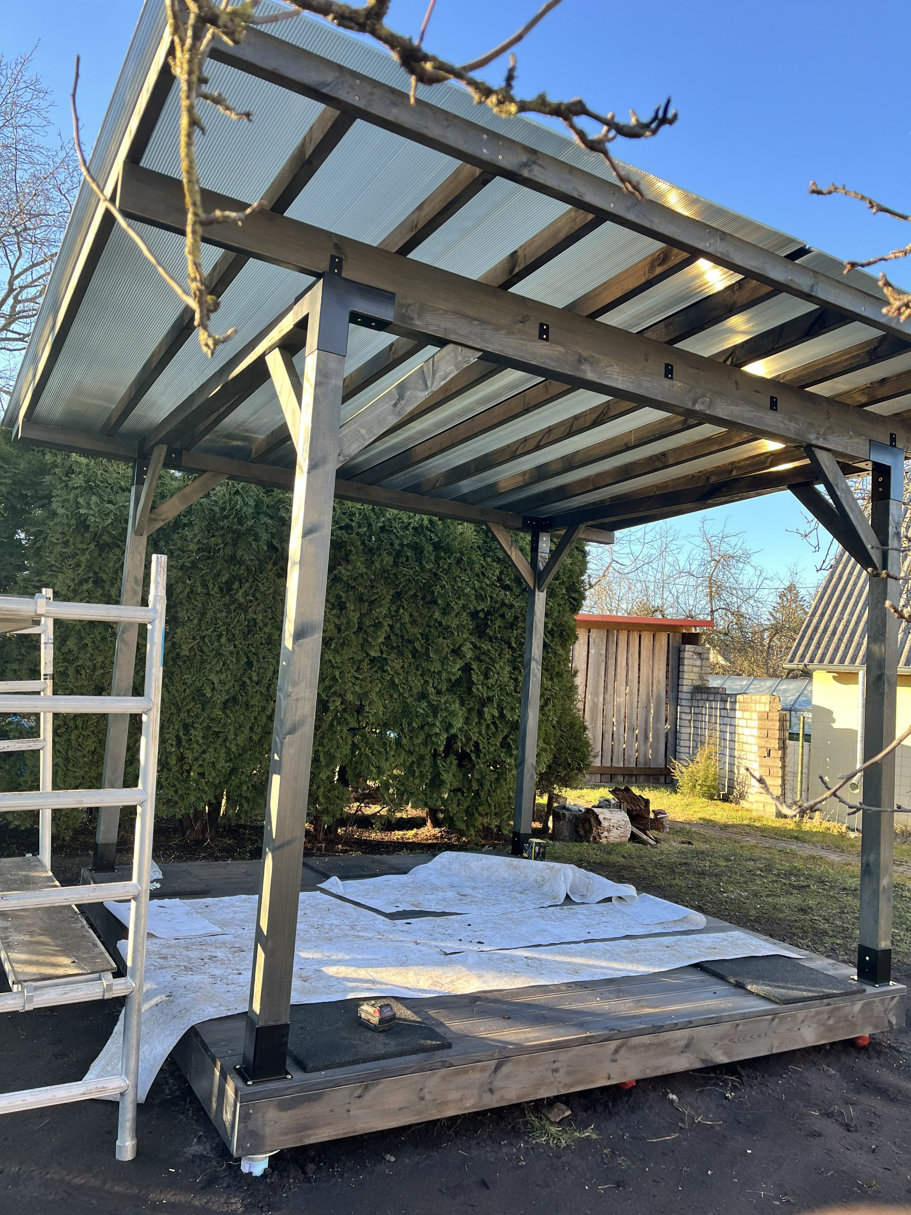 Terrace deck 3x3 meter with canopy by Terases, showing outdoor wooden flooring and fabric canopy in a backyard setting.