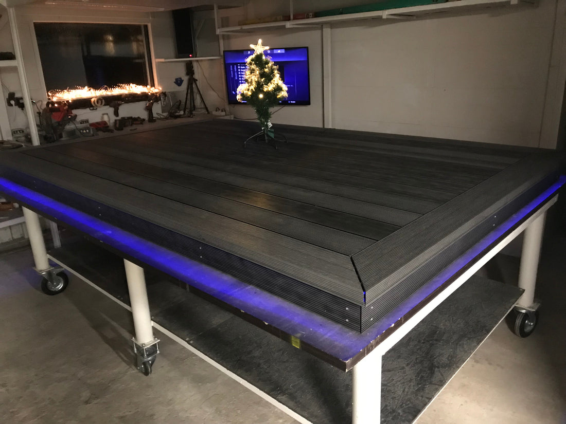 Large flatbed truck with LED lights in a workshop setting