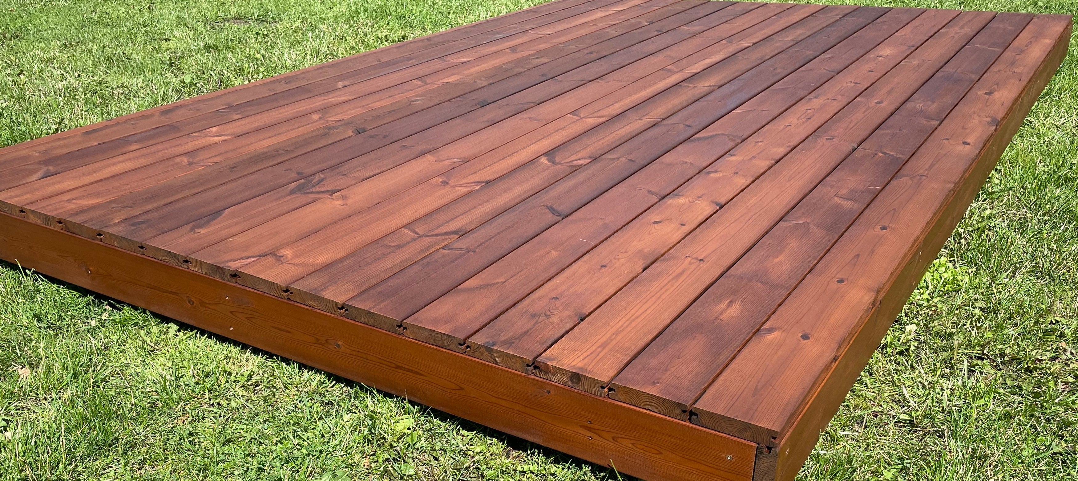 Wooden deck on grass