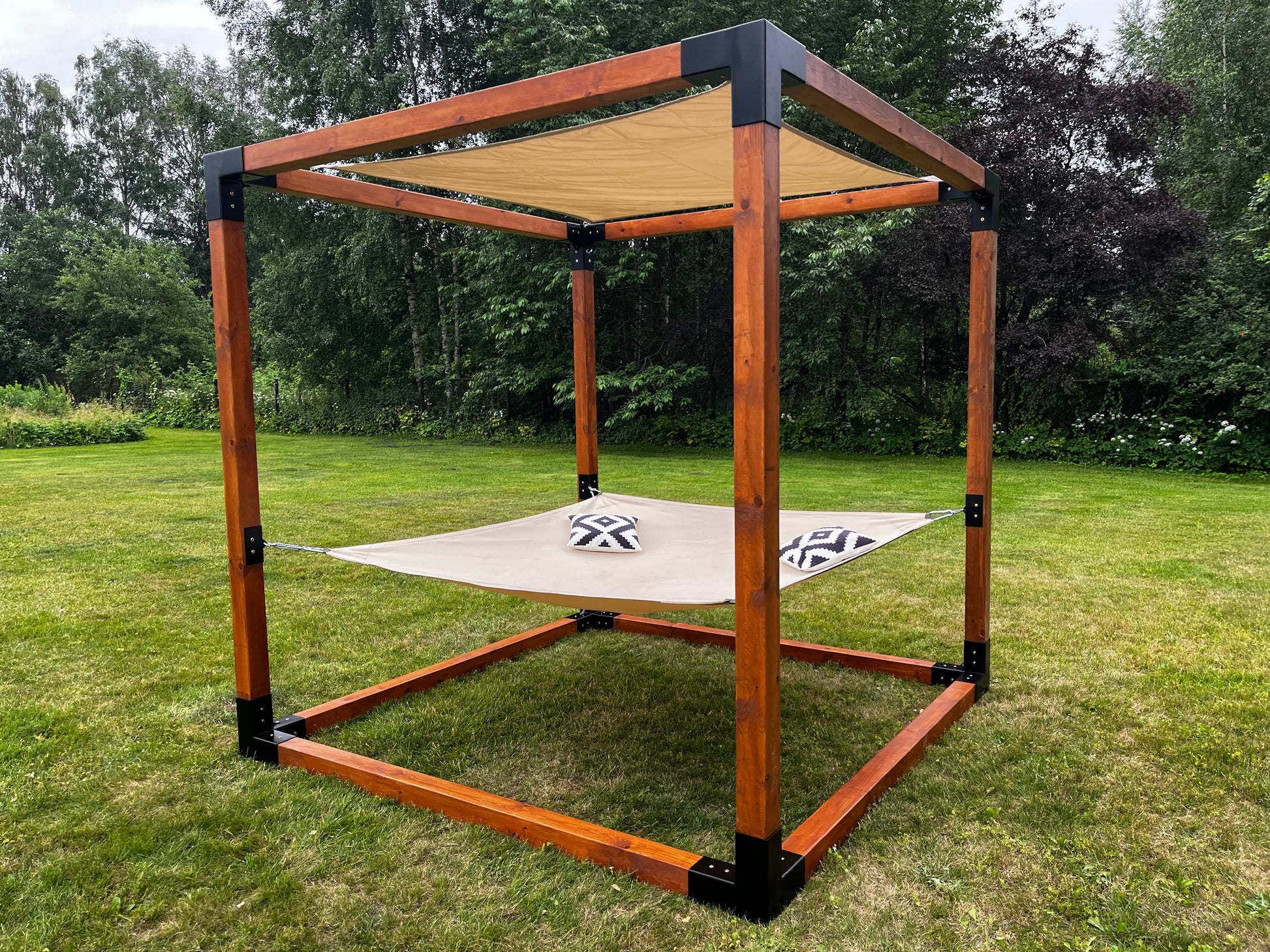 Sunshade for modular relaxation cube with tensioners.