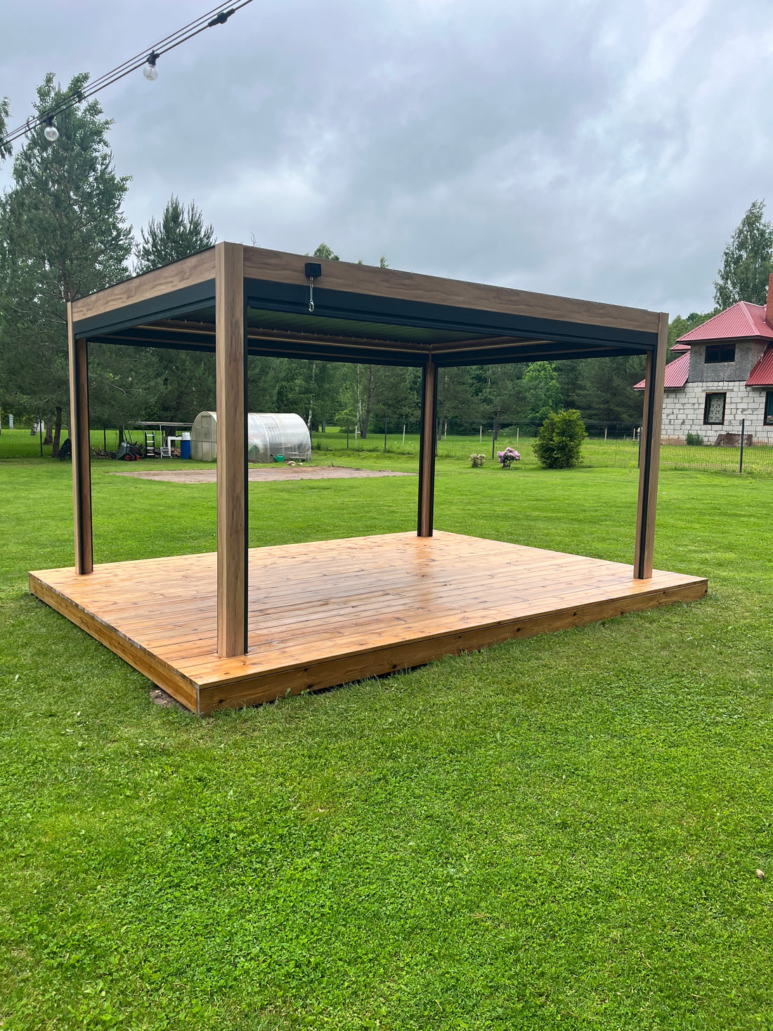 Terrace deck by Terases, 4.6m x 3.2m, featuring wooden planks and sturdy support beams for outdoor patio or deck area.